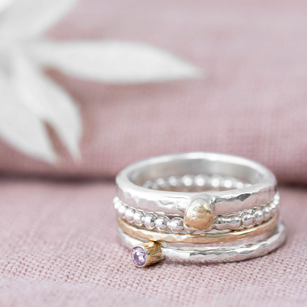 Lovely Silver stacking ring with 9ct gold setting of a Cubic Zirconia